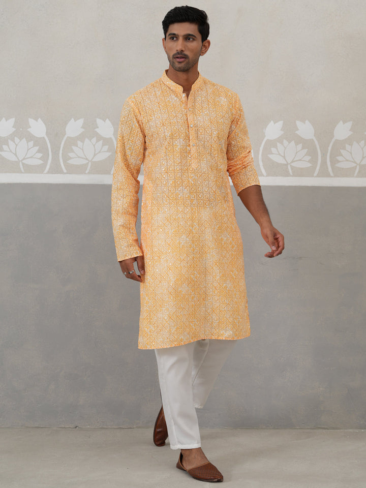 Printed And Embroidered Kurta Pyjama Set.