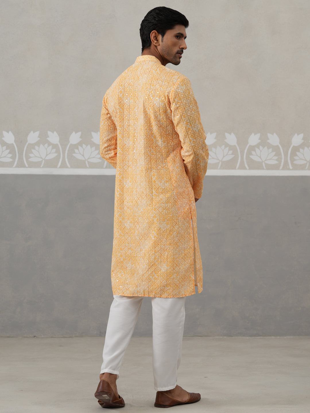 Printed And Embroidered Kurta Pyjama Set.