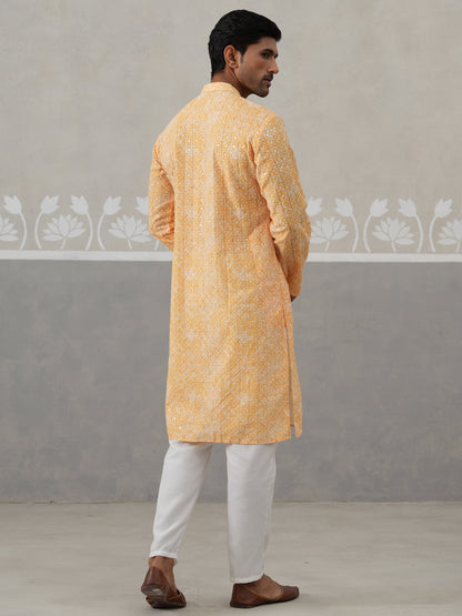 Printed And Embroidered Kurta Pyjama Set.