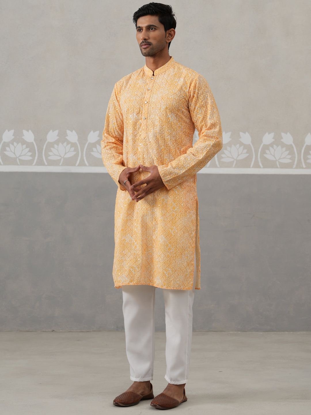 Printed And Embroidered Kurta Pyjama Set.