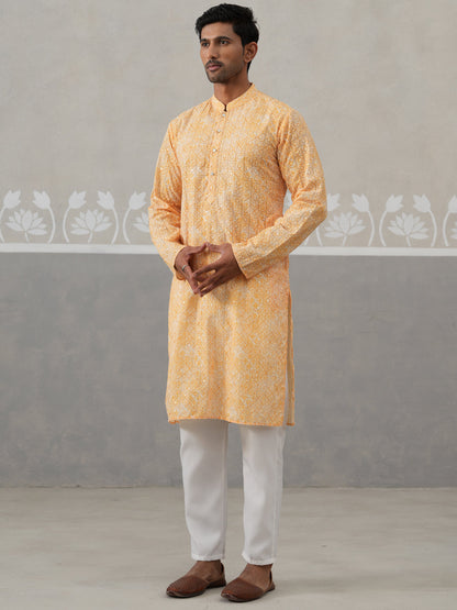 Printed And Embroidered Kurta Pyjama Set.