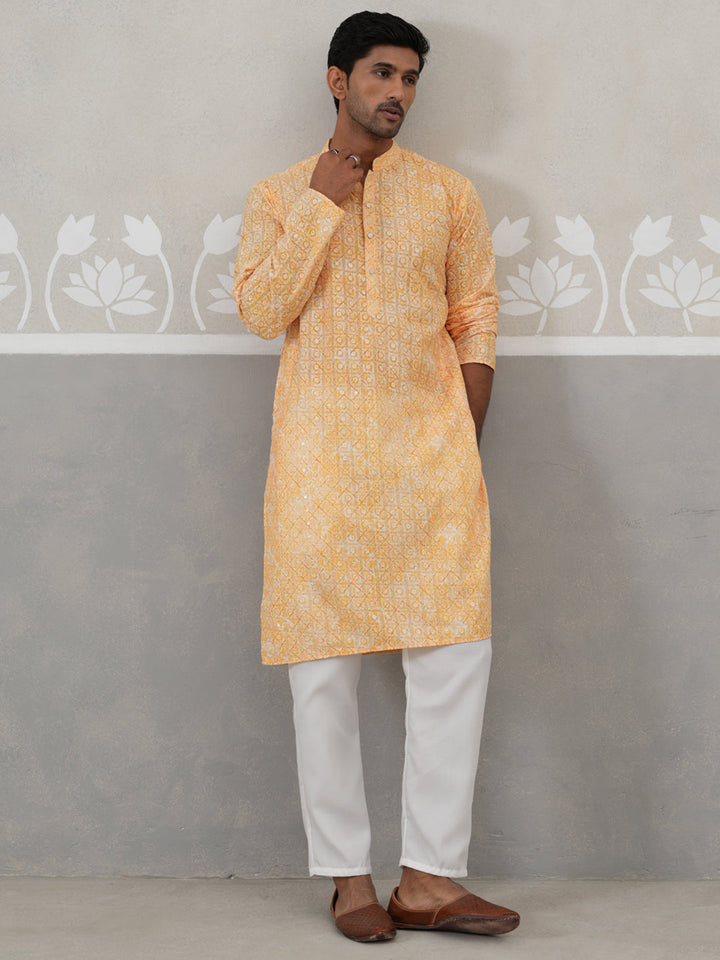 Printed And Embroidered Kurta Pyjama Set.