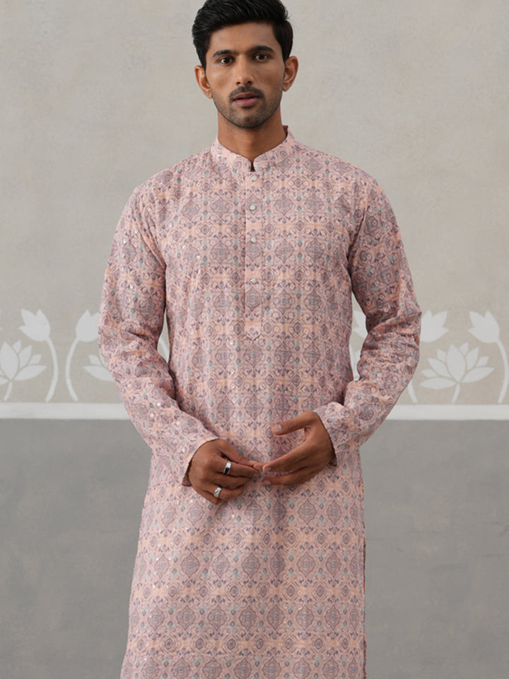 Printed And Embroidered Kurta Pyjama Set.