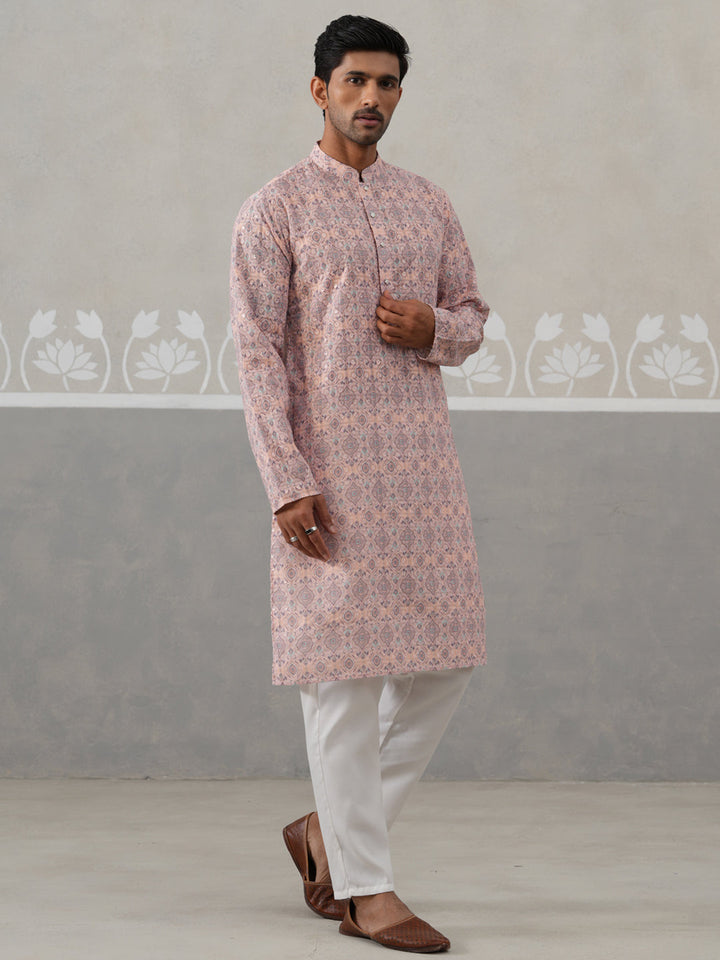 Printed And Embroidered Kurta Pyjama Set.