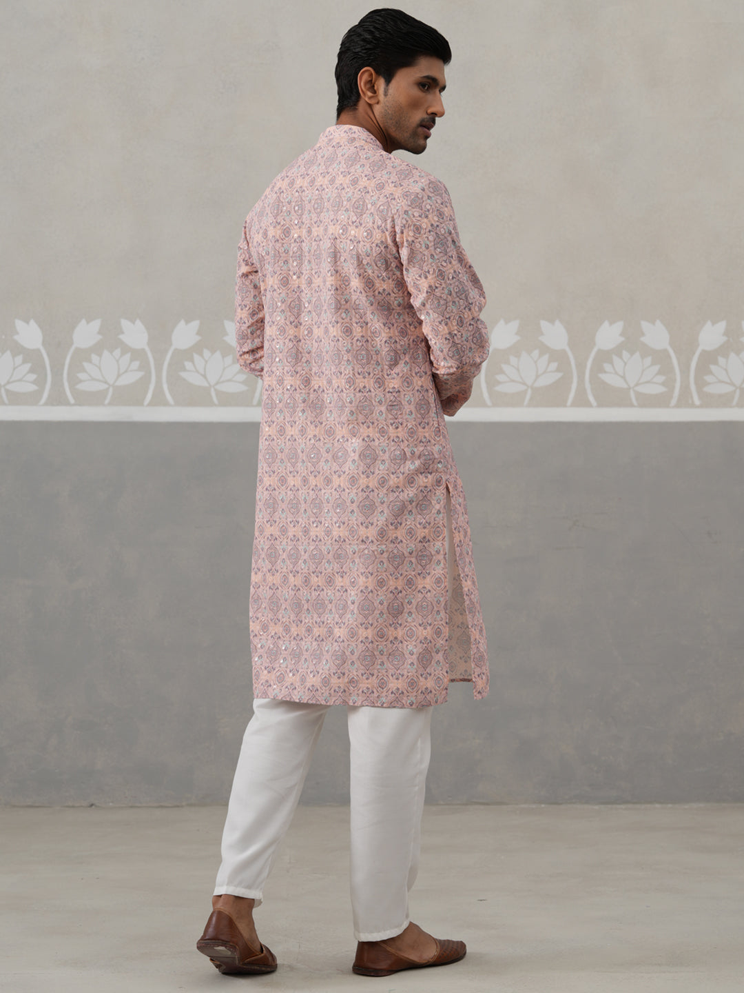 Printed And Embroidered Kurta Pyjama Set.