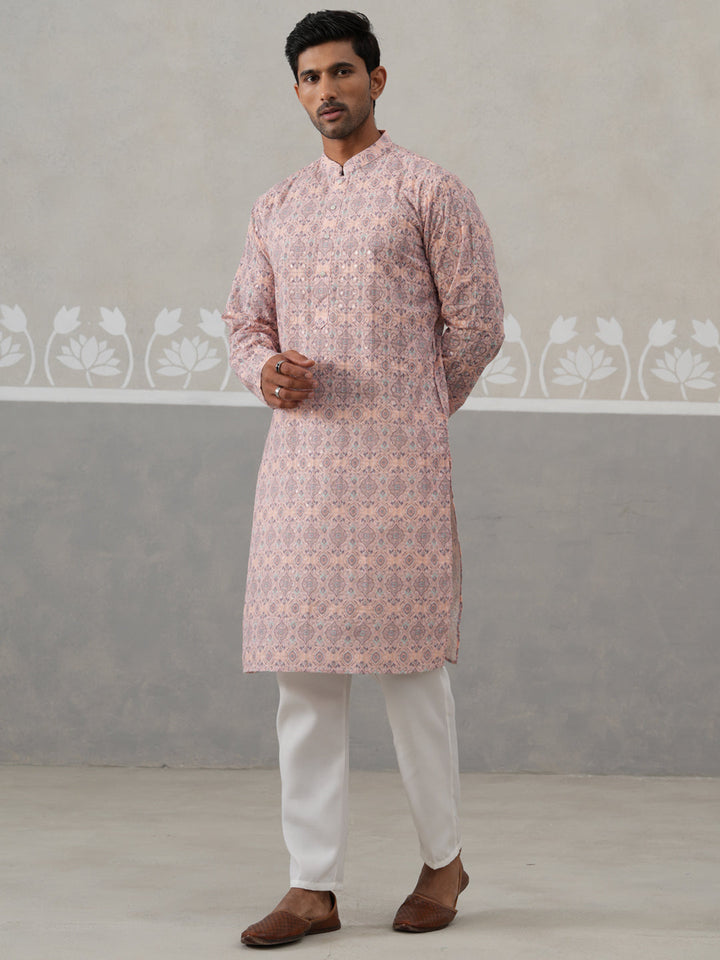Printed And Embroidered Kurta Pyjama Set.