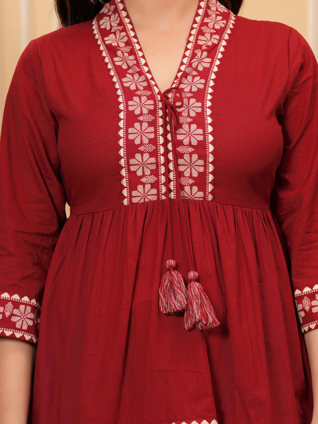 Maroon Solid Tops & Tunic - Cotton Fabric, 3/4 sleeves, V-Neck and hips Length.