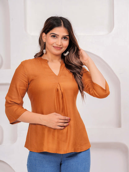 Orange Solid Tops & Tunic - Viscose Moss Fabric, 3/4 sleeves, V-neck collar and hips Length.