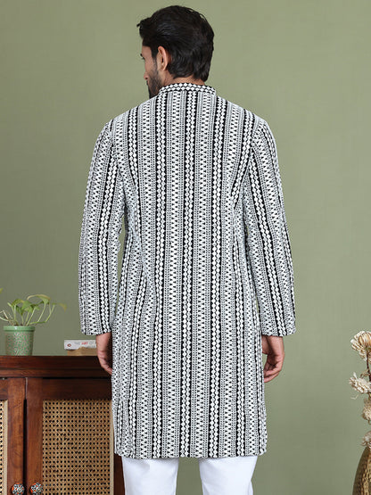 Embroidered And Mirror Work Kurtas.