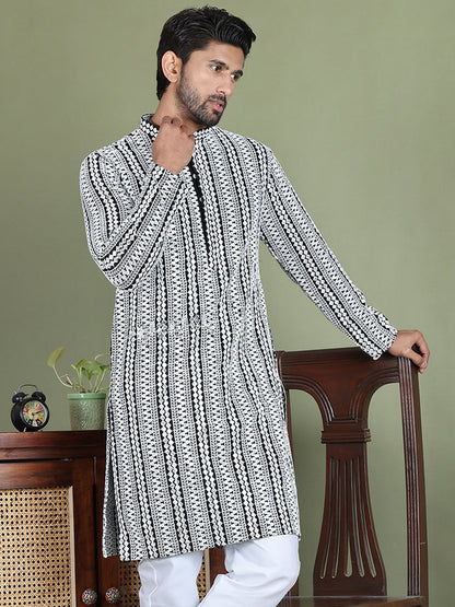 Embroidered And Mirror Work Kurtas.