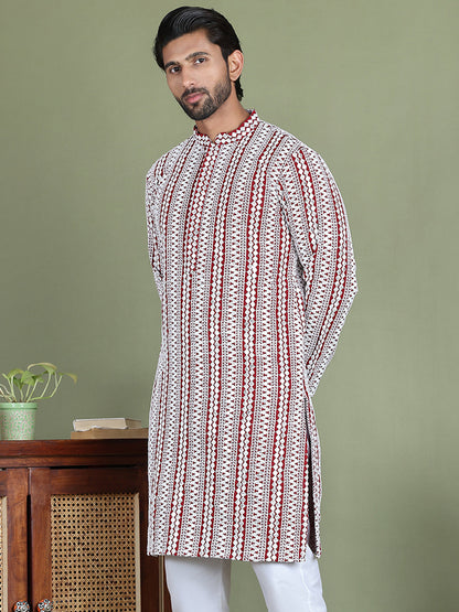 Embroidered And Mirror Work Kurtas.