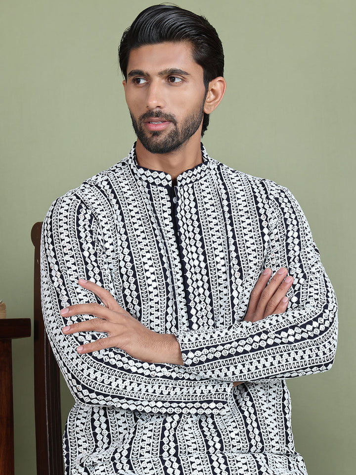 Embroidered And Mirror Work Kurtas.