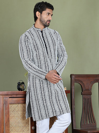 Embroidered And Mirror Work Kurtas.