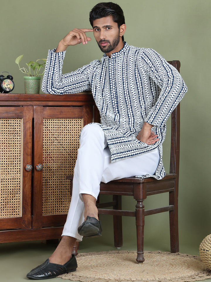 Embroidered And Mirror Work Kurtas.