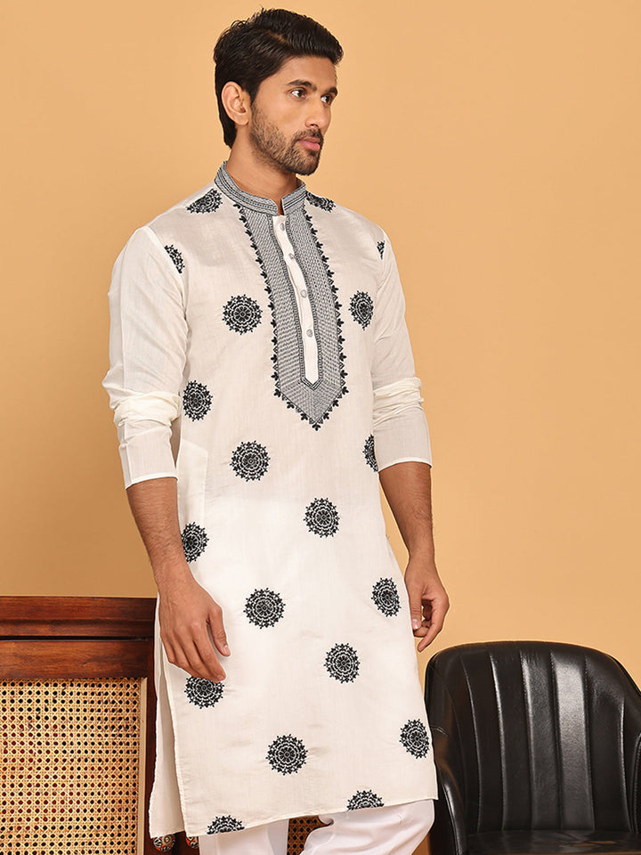 White Embroidered And Sequins Kurtas.