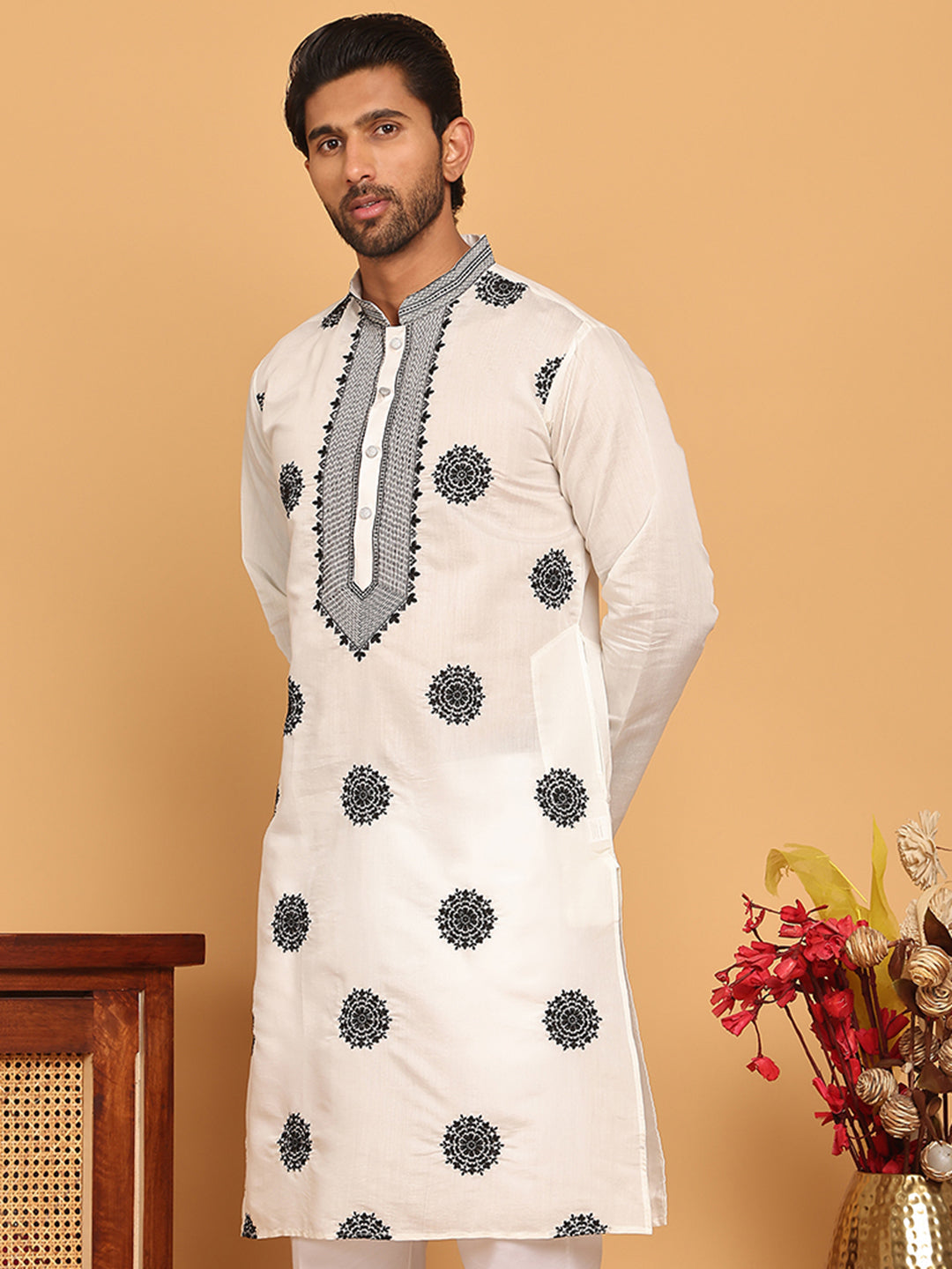 White Embroidered And Sequins Kurtas.