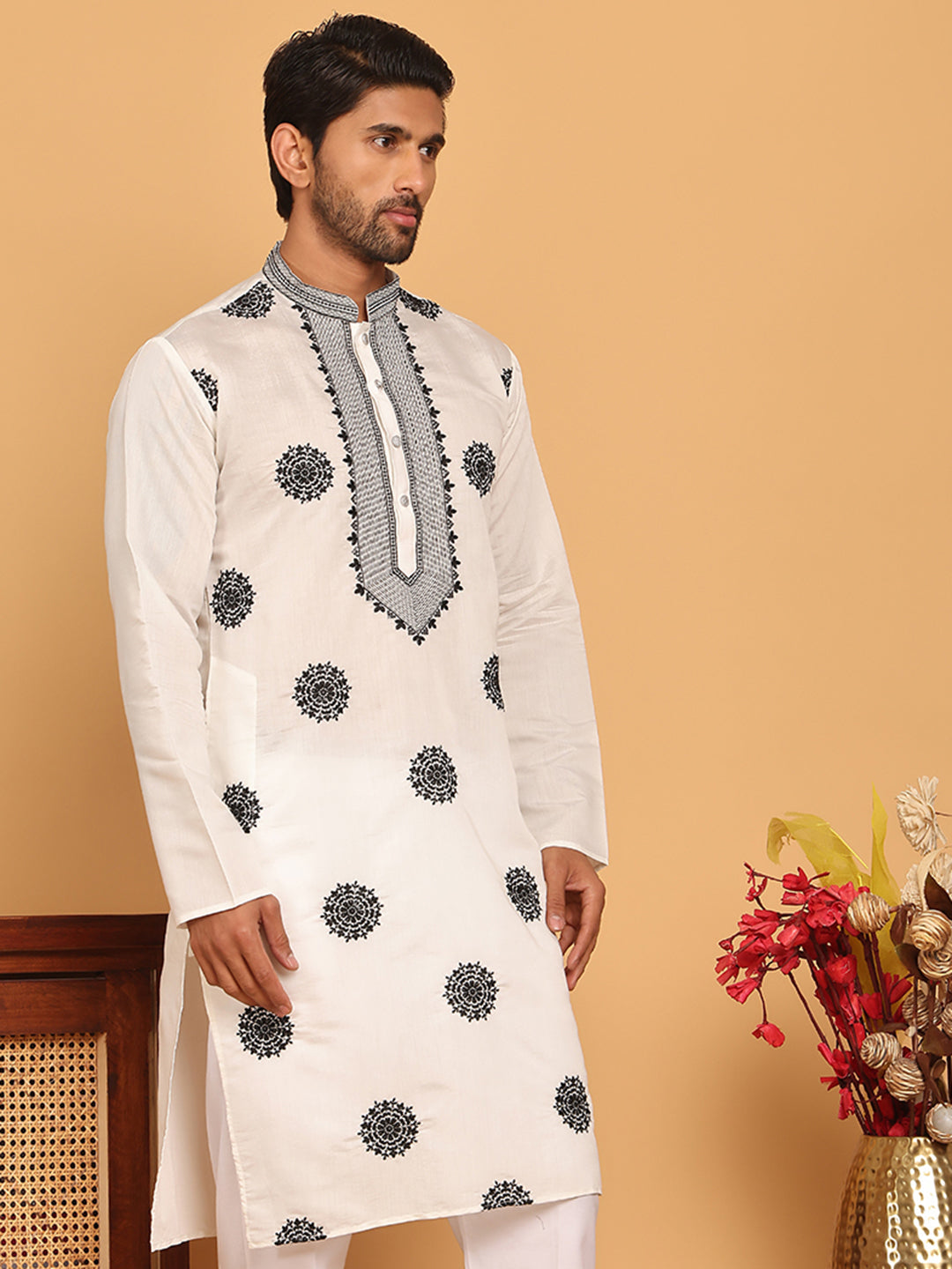 White Embroidered And Sequins Kurtas.