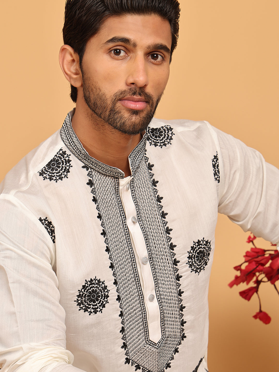 White Embroidered And Sequins Kurtas.