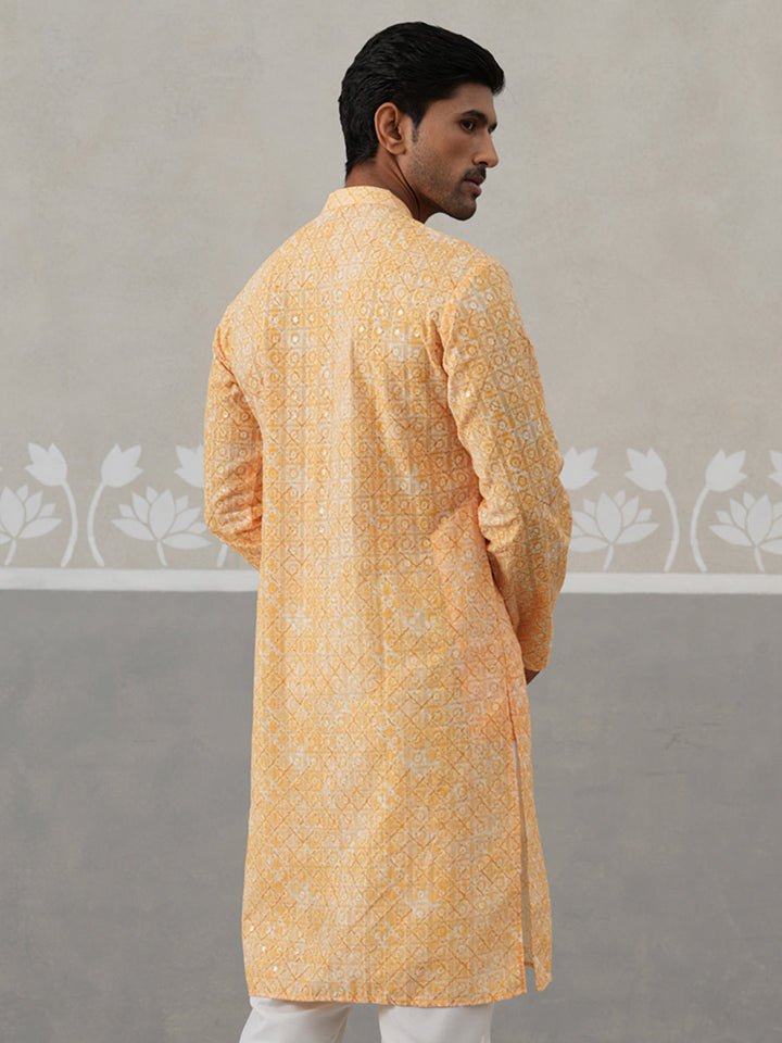 Printed And Embroidered Kurta.