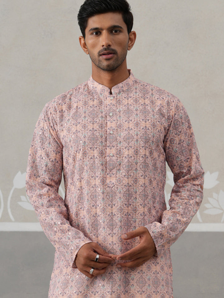 Printed And Embroidered Kurta.