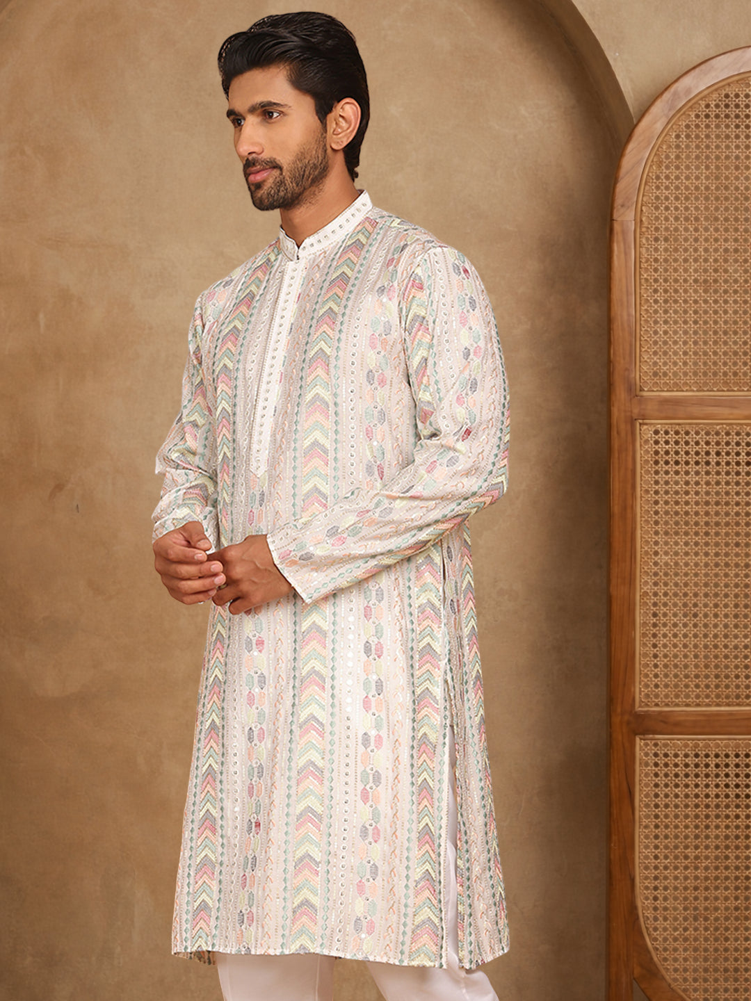 White Embroidered And Sequins Kurta, White Straight Knee Length Kurta, Has A Mandarin Collar, Long Sleeves, Straight Hem.