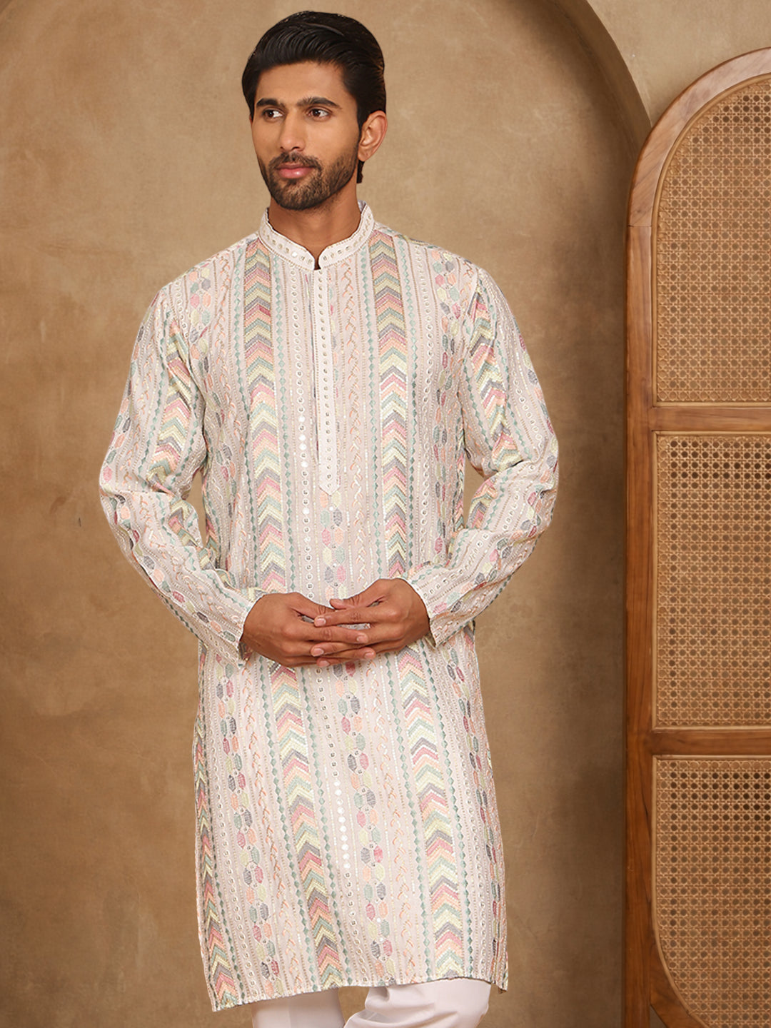 White Embroidered And Sequins Kurta, White Straight Knee Length Kurta, Has A Mandarin Collar, Long Sleeves, Straight Hem.