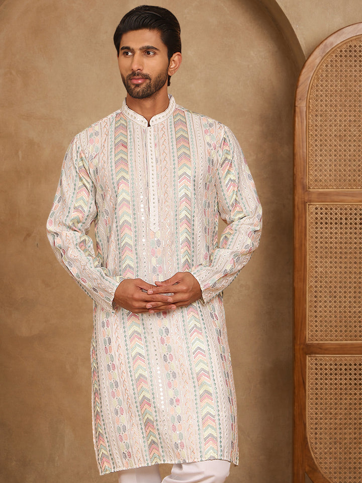 White Embroidered And Sequins Kurta, White Straight Knee Length Kurta, Has A Mandarin Collar, Long Sleeves, Straight Hem.