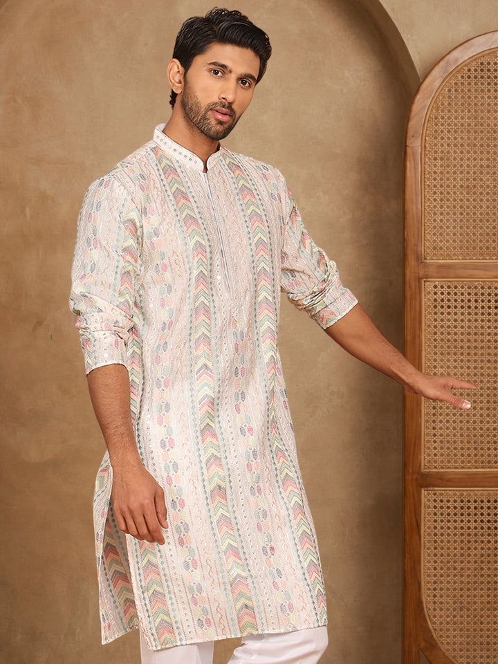 White Embroidered And Sequins Kurta, White Straight Knee Length Kurta, Has A Mandarin Collar, Long Sleeves, Straight Hem.