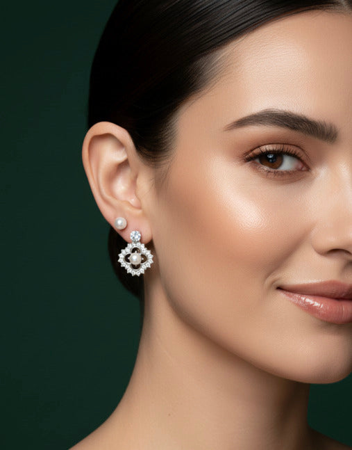 Two pairs of stud earrings