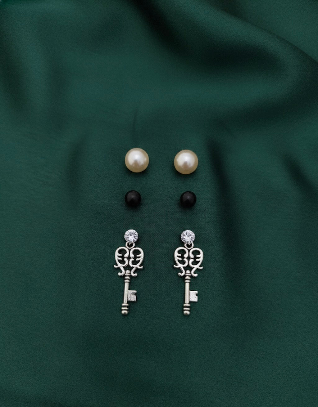 Two Mini Studs & one Key Style Earrings