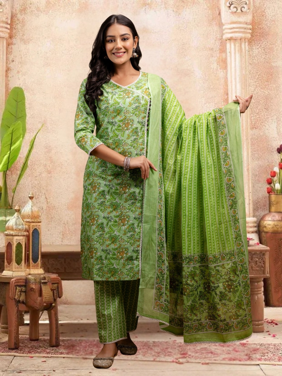 Floral Bliss Light Green Cotton Kurta Set With Dupatta.