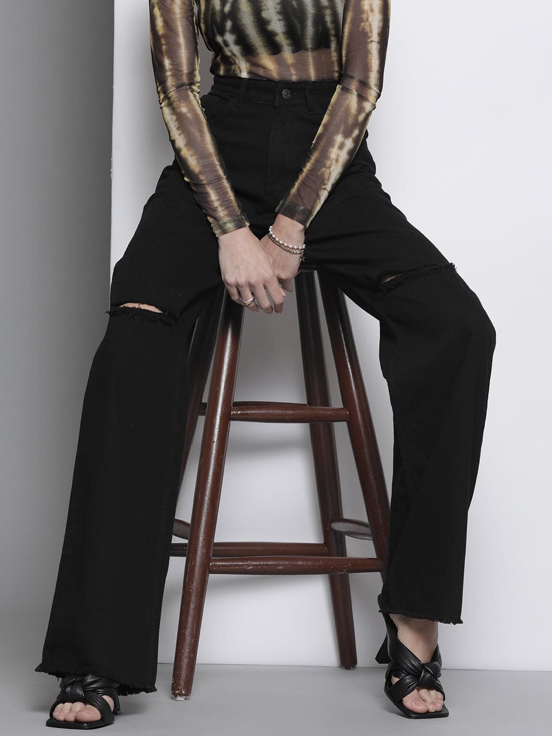 Women's Women Black Distressed Slit Jeans in Cotton by Sassafras for wholesale, bulk, supplier, manufacturer and wholesaler buyers from Trendphoria