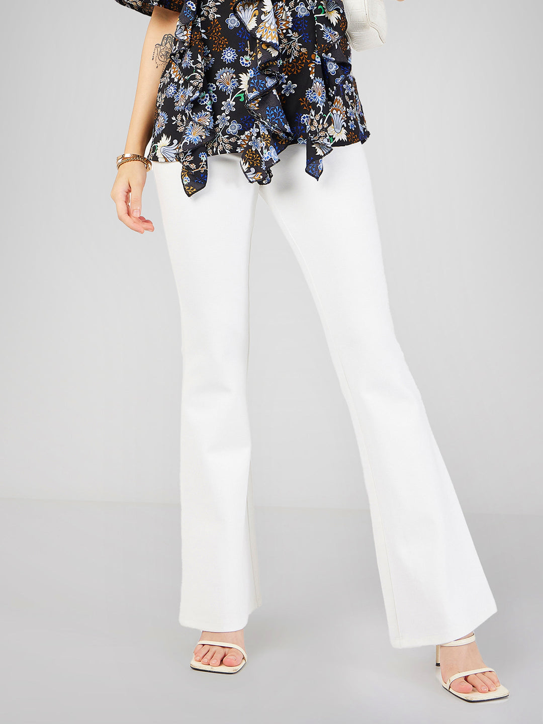 Women's Women White Bell Bottom 4-Way Stretch Pants in Rayon by Sassafras for wholesale, bulk, supplier, manufacturer and wholesaler buyers from Trendphoria