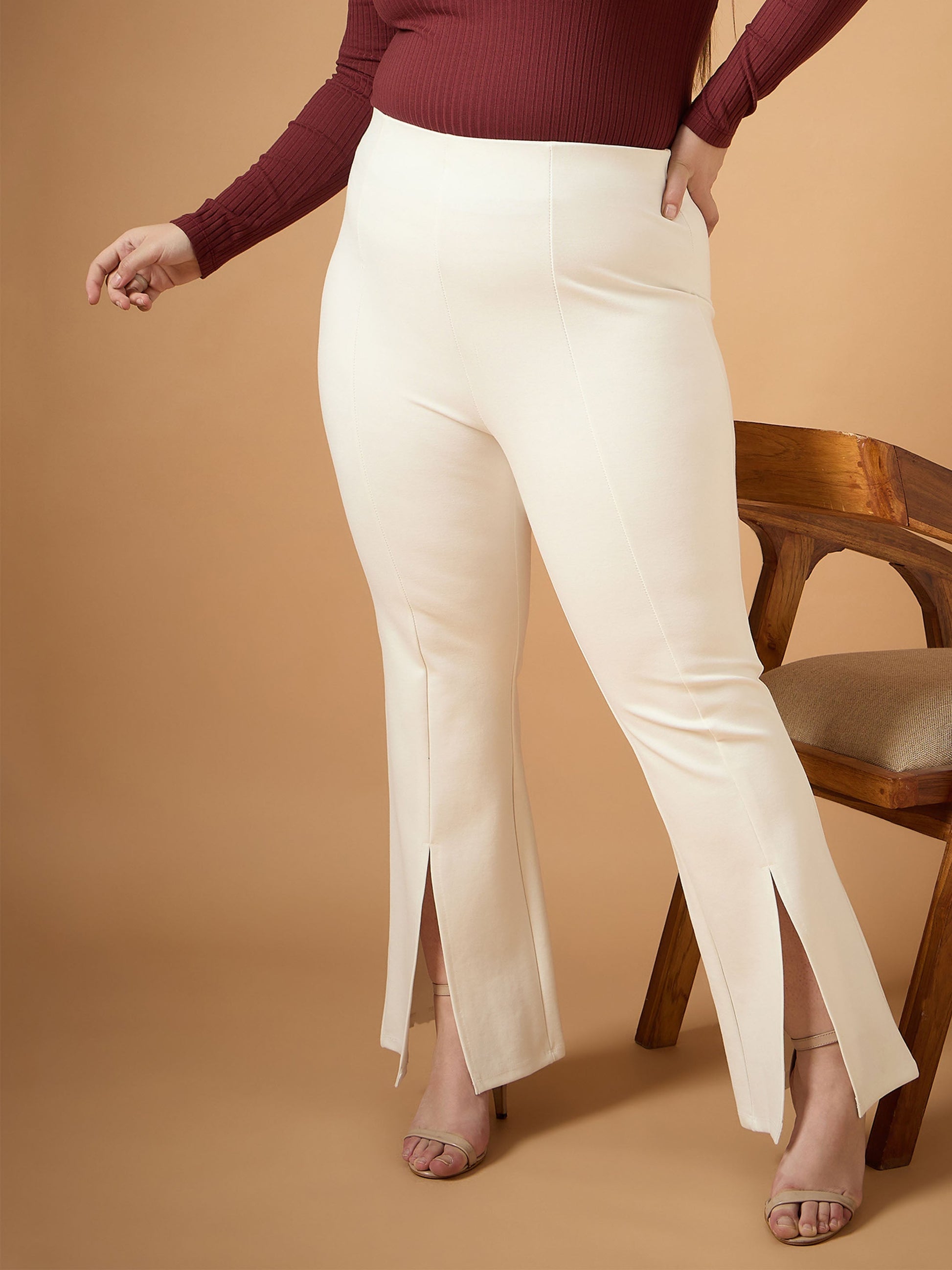 Plus size women's White Rayon White Front Slit Detail Bell Bottom Pants by Sassafras Curve for wholesale buyers, boutiques, resellers and bulk orders