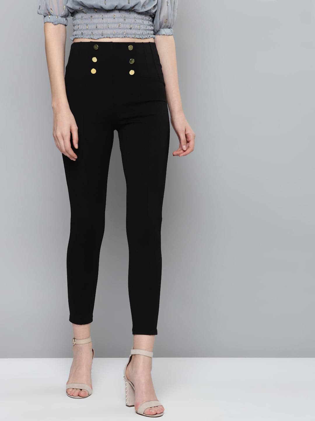 Women's Black Front Button High Waist Jeggings in Rayon by Sassafras for wholesale, bulk, supplier, manufacturer and wholesaler buyers from Trendphoria