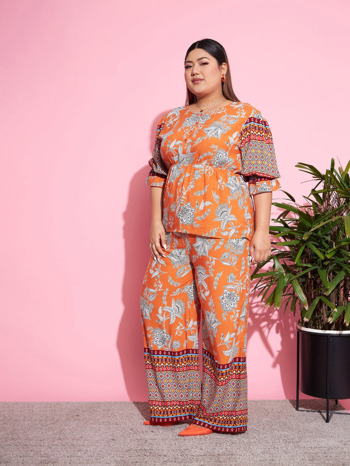 Orange Floral Peplum Top With Straight Pants-SASSAFRAS Curve