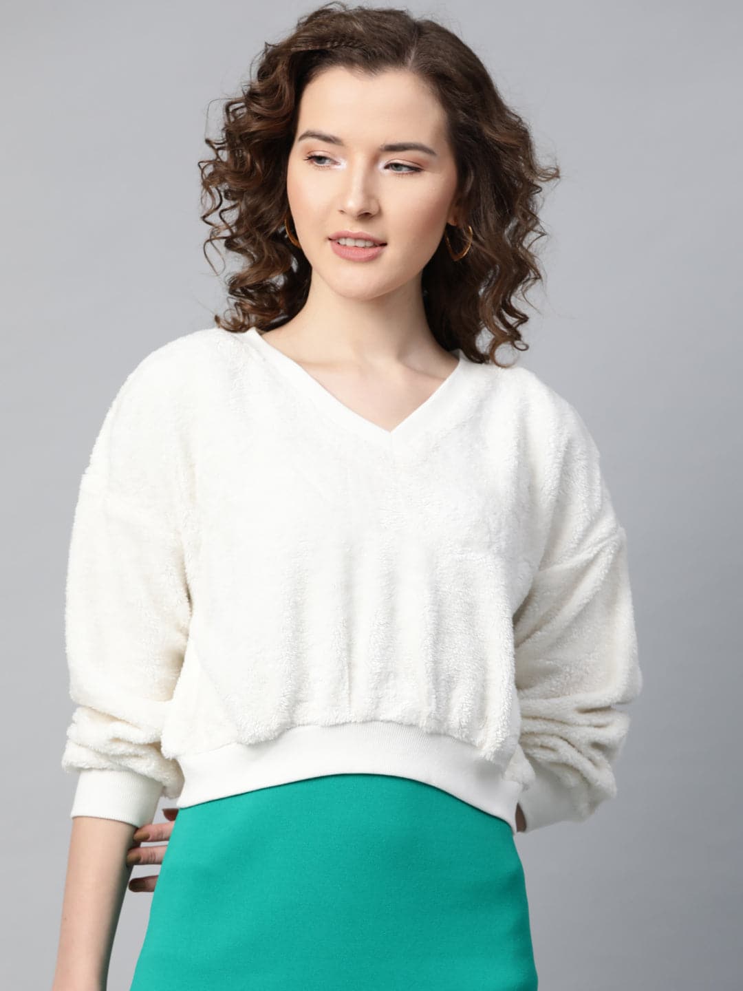 Women's White V-Neck Faux Fur Crop Sweatshirt in Polyester by Sassafras for wholesale, bulk, supplier, manufacturer and wholesaler buyers from Trendphoria