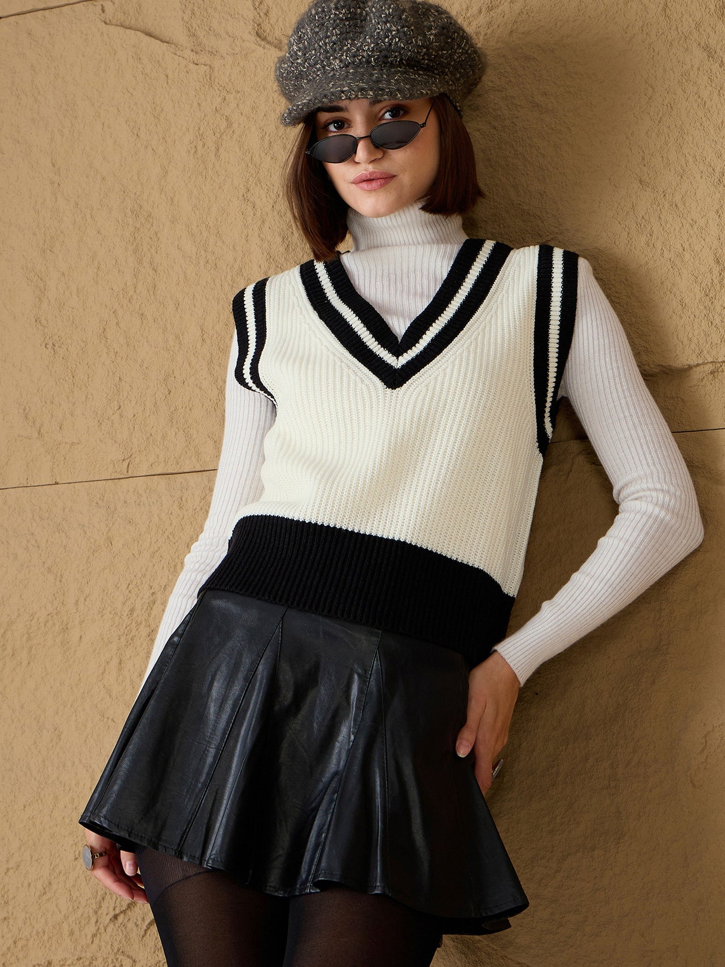 Women's Women Black & White Striped V-Neck Sweater Vest in Acrylic by Sassafras for wholesale, bulk, supplier, manufacturer and wholesaler buyers from Trendphoria