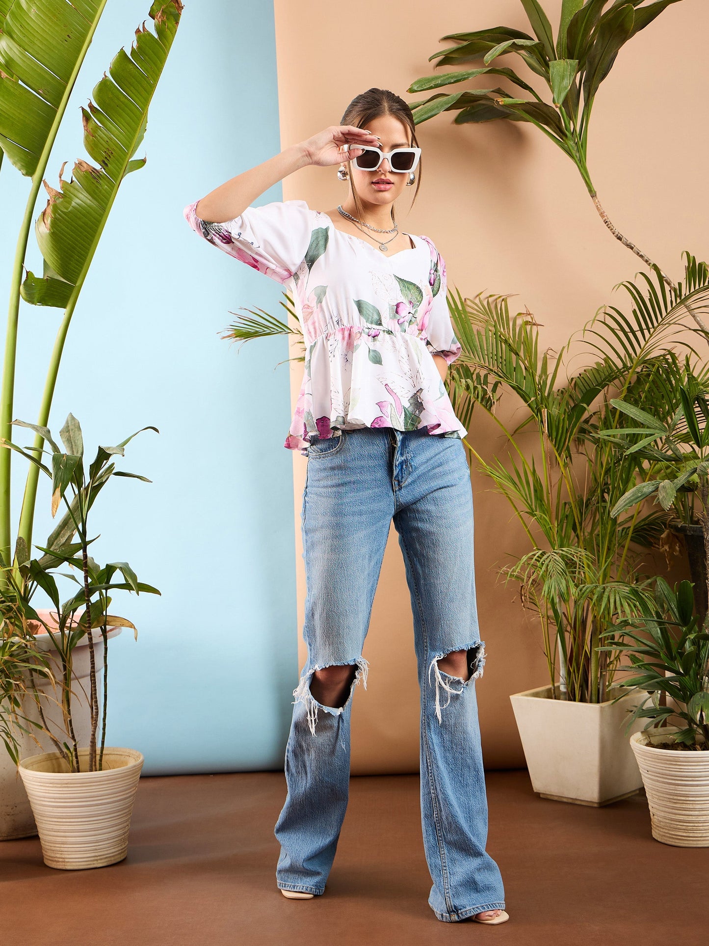 White Floral Criss Cross Back Peplum Top
