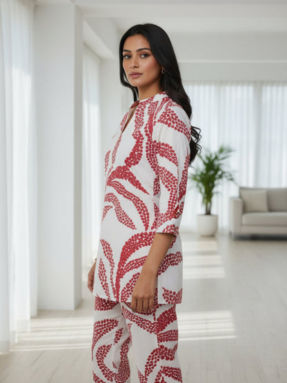 Pink Self Design Viscose Rayon Fabric Three-Quarter Sleeves V-Neck Hip Length Kurta Set