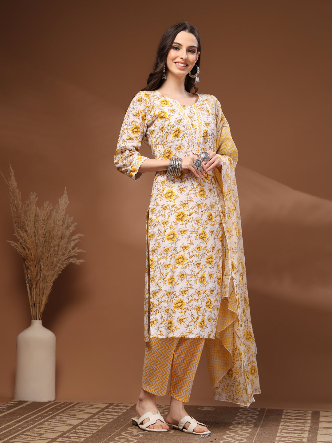 Mustard Self Design Cotton Fabric 3/4 Sleeves Round Neck Calf length Kurta Bottom Set With Dupatta