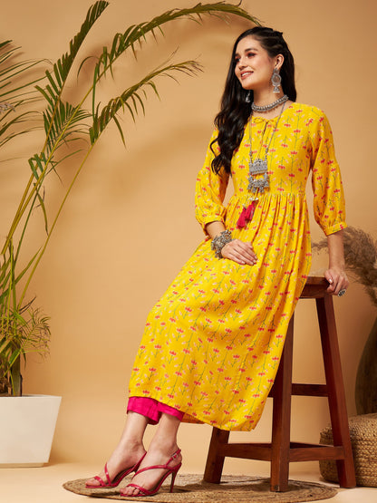 Yellow Floral Bishop Sleeves Tie-Up Kurta-Shae by SASSAFRAS