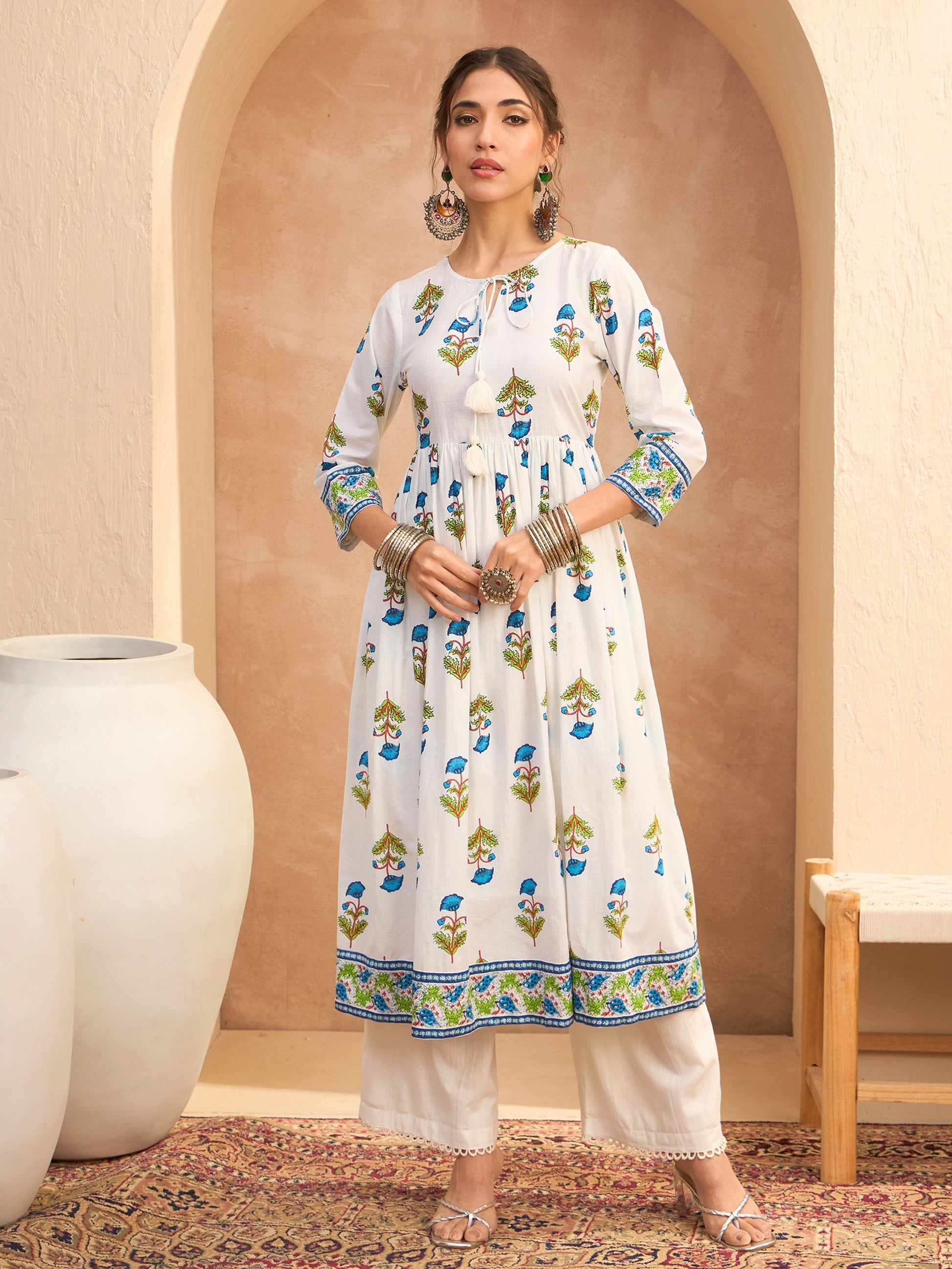 Women's Women White Floral Front Dori Gathered Kurta in Cotton by Shae for wholesale, bulk, supplier, manufacturer and wholesaler buyers from Trendphoria