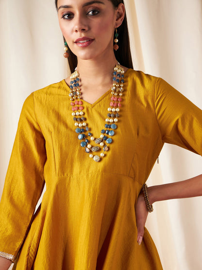 Mustard Zari Embroidered Peplum Top With Dhoti Pants-Shae by SASSAFRAS