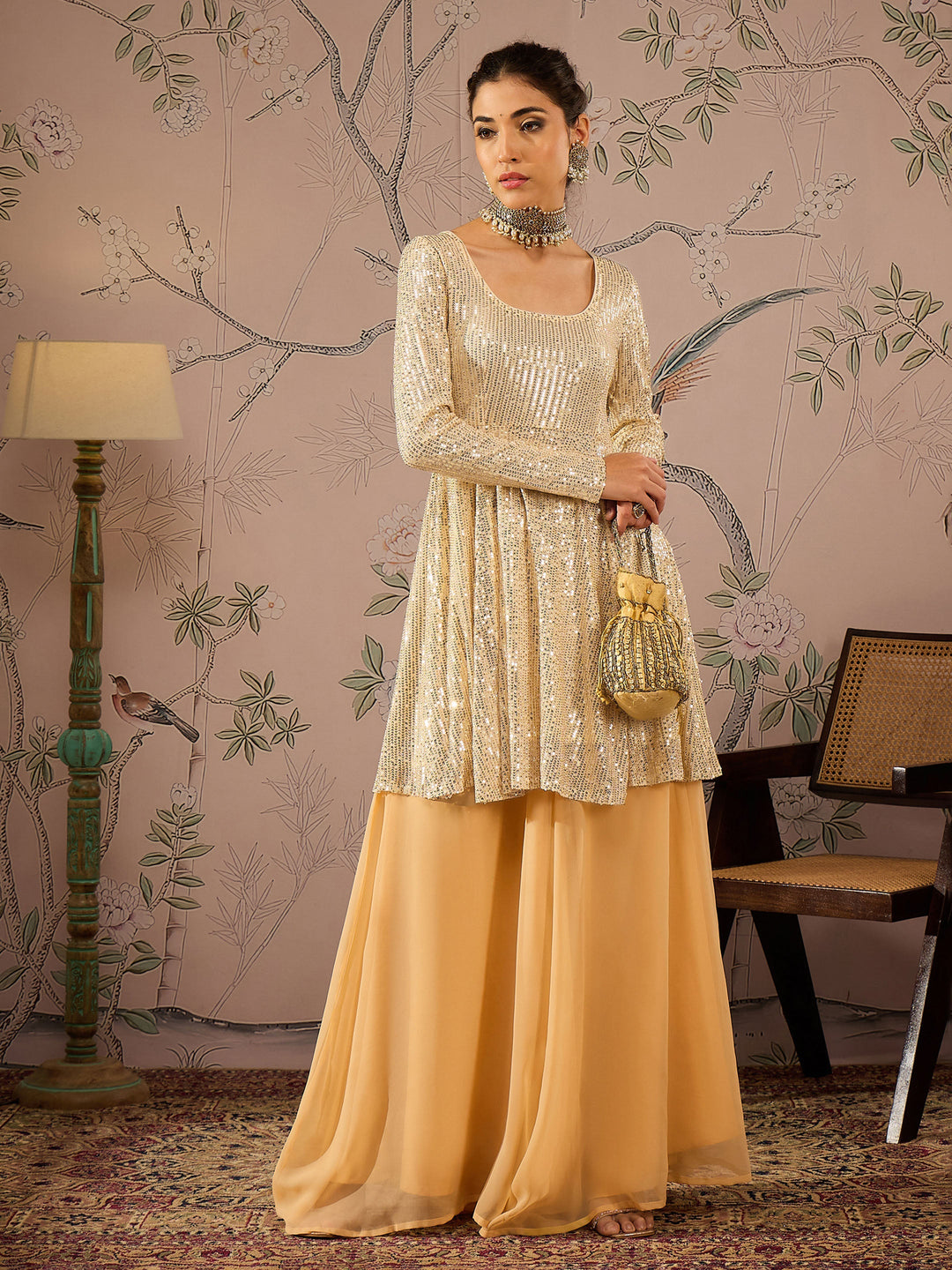 Women's Women Gold Sequins Peplum Top With Flared Pants in Georgette by Shae for wholesale, bulk, supplier, manufacturer and wholesaler buyers from Trendphoria