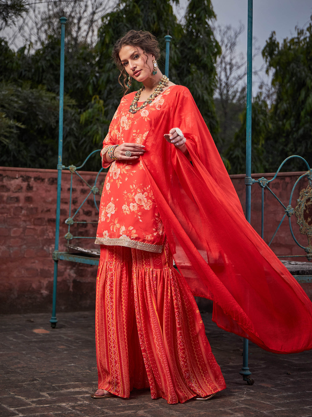 Orange Floral Short Kurta With Sharara Pants &amp; Dupatta-Shae by SASSAFRAS