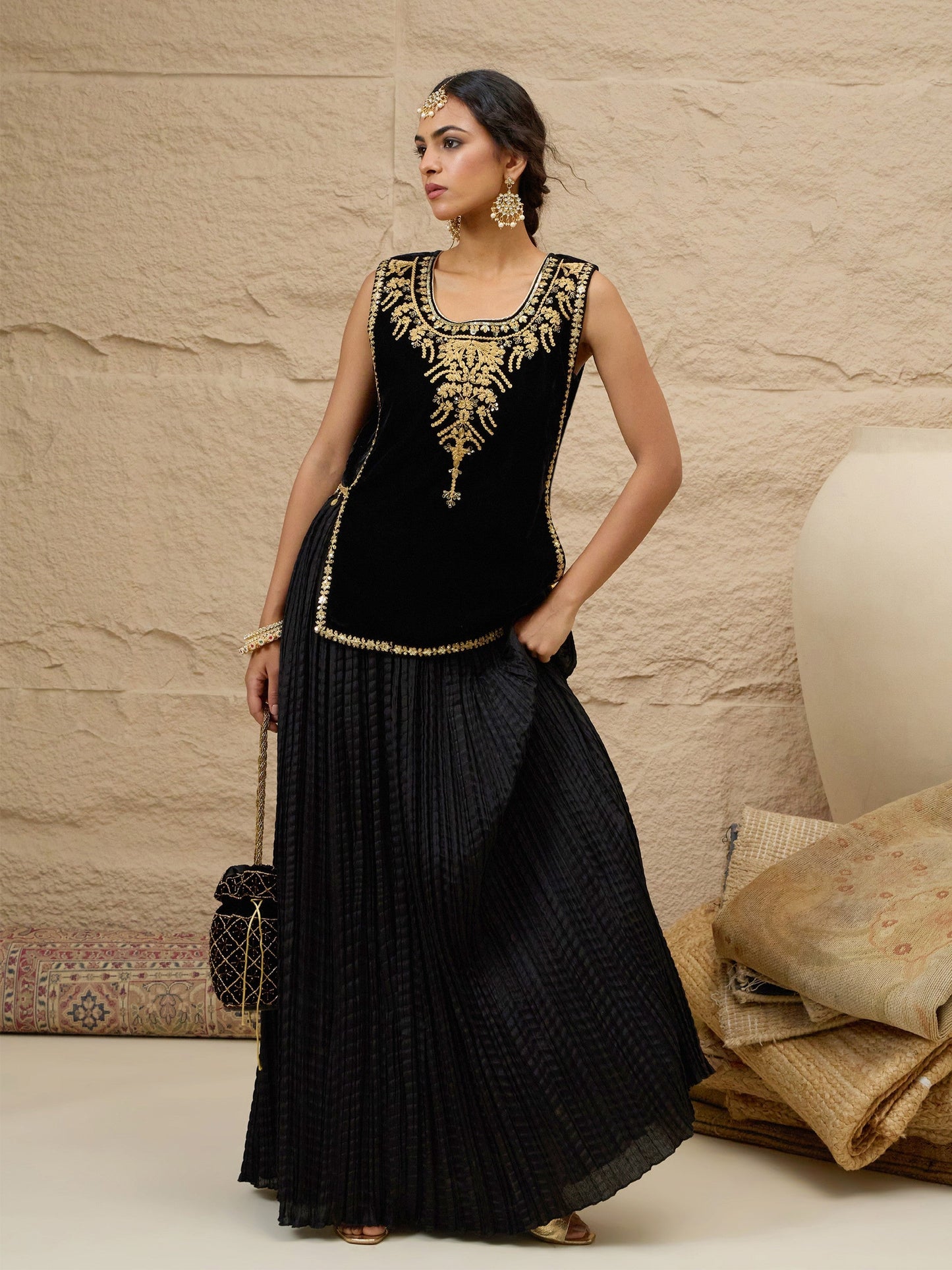 Women Black Velvet Sleeveless Top With Pleated Skirt