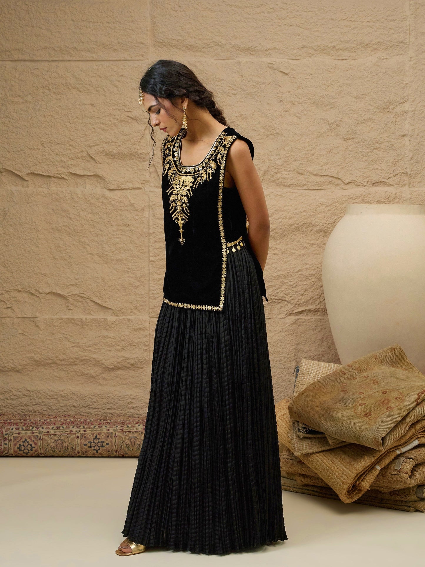 Women Black Velvet Sleeveless Top With Pleated Skirt