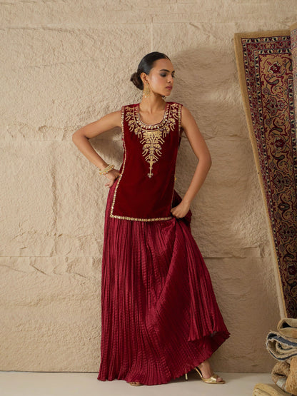 Women Maroon Velvet Sleeveless Top With Pleated Skirt