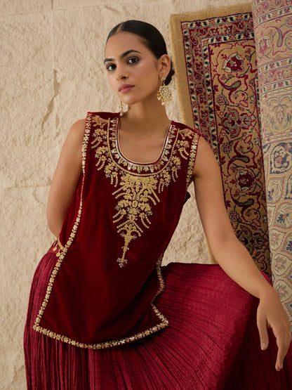 Women Maroon Velvet Sleeveless Top With Pleated Skirt